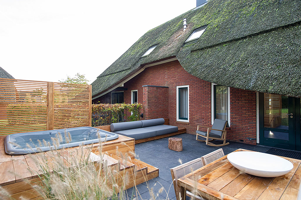 garage paneel Grijpen De mooiste huisjes met buiten bubbelbad/jacuzzi in Nederland